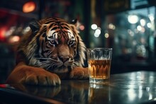 Drinking Tiger With A Glass Of Beer.