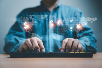 Wall Mural - Businessman typing computer keyboard with virtual map and international currency include dollar Yuan Euro pound sterling ruble for forex trading and money transfer concept.