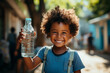 Leinwandbild Motiv Draught in Africa, lack of clean water, world's global warming, climate change problem concept. Happy little thirsty child with bottle of pure fresh drinking water in his hand. Generative AI