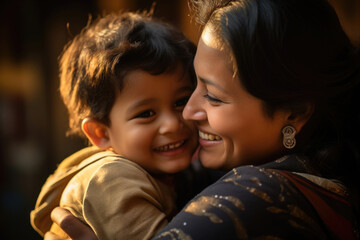 a woman's face lights up with a warm smile and looking affectionately at her child. they share a joy
