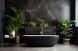 bathtub and plants in modern luxury bathroom with dark marble walls.
