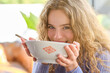 © ADDICTIVE STOCK CORE - Positive lady with bowl of soup