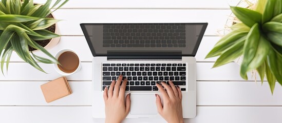 Poster - A woman working from home on a laptop with a blank screen The computer rests on a table Room for text