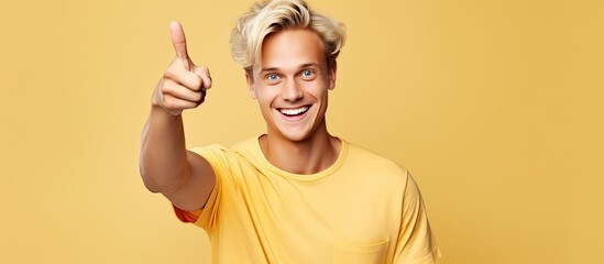 Poster - Blond man happily pointing to an idea feeling carefree