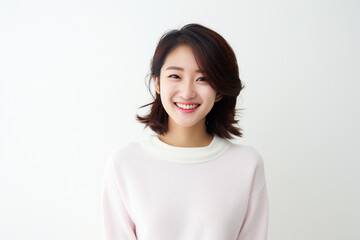 Wall Mural - korean woman college student on a gray background with white shirt