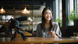 © Studio Nova - Female blogger recording a video.