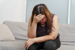 © Charlie's - Sad Overweight plus size woman thinking about problems on sofa upset girl feeling lonely and sad from bad relationship or Depressed woman disorder mental health
