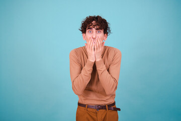 Sticker - Funny curly guy with different emotions posing in the studio.