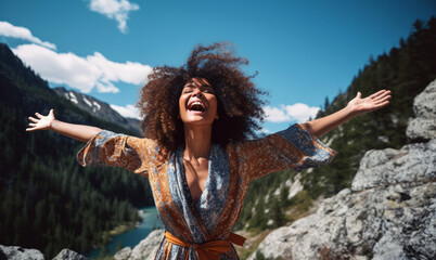 Joyful young African American woman hiking in nature, exuding vitality and laughter, embracing the beauty of the outdoors, mountains and forest in the background