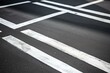 Dashed white road marking on urban asphalt. Generative AI