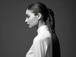 Woman with modern beautiful ponytail hairstyle, profile view, black and white colors.