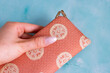 © PhotosByBrieanna - A lovely Japanese silk billfold clutch against an artistic background of blue marble.