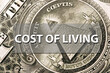 Cost of living - Portion of a dollar bill US Currency 