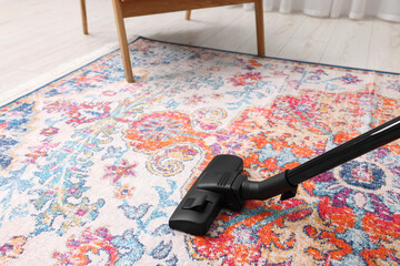 Canvas Print - Hoovering carpet with vacuum cleaner indoors, space for text