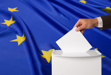 Man putting his vote into ballot box against flag of Europe, closeup. Space for text