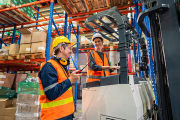 Wall Mural - Caucasian man and woman industrial worker work in manufacturing plant. 