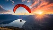 a person parachuting in the air with mountains in the background