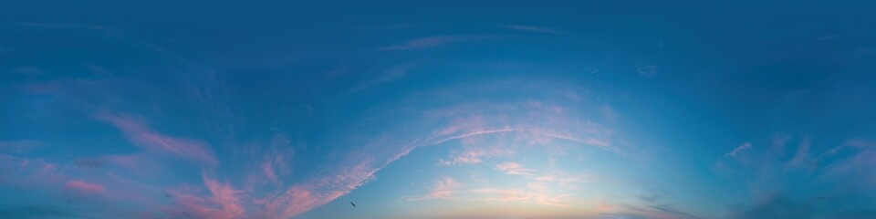 Wall Mural - Sunset sky panorama with bright glowing pink Cirrus clouds. Seamless hdr 360 panorama in spherical equirectangular format. Full zenith for 3D visualization, sky replacement for aerial drone panoramas.