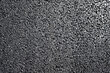 Asphalt black background. Asphalt texture. Abstract grunge background. Dark. Grunge asphalt background