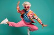 funny old lady doing gymnastics or dancing on colored background