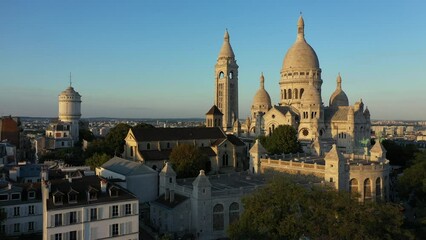 Wall Mural - Aerial view of Montmartre hill during sunset Paris France