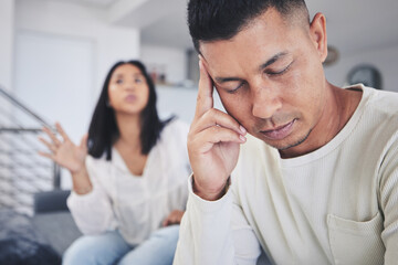 Wall Mural - Frustrated couple, headache and fight in argument, divorce or conflict from argument on living room sofa at home. Unhappy man and woman in breakup, cheating affair or toxic relationship at the house