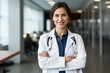 © Khoi Dang - Portrait of a confident smiling female doctor with stethoscope at hospital, high quality generative ai