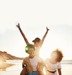© Ramba/peopleimages.com - Beach sunset, happy and group of friends piggyback, smile and enjoy travel vacation, summer freedom or tropical adventure. Having fun, wellness and gen z women excited for holiday, bonding or break