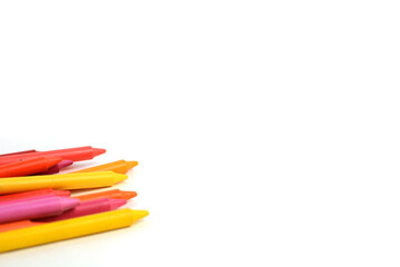 Crayons lined up isolated on white background.