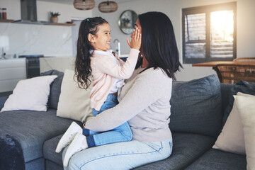 Poster - Touch, happy and playful with mother and daughter on sofa for love, care and support. Funny, calm and relax with woman and young girl embrace in living room of family home for peace, cute and bonding