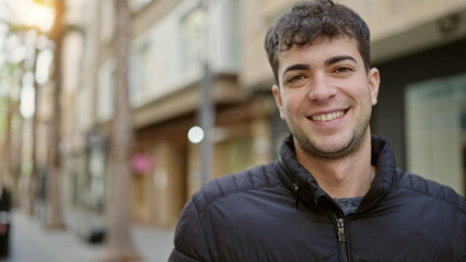 Poster - Young hispanic man smiling confident at street