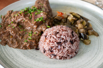 Poster - Gardiane de Taureau, gardianne, or daube camarguaise bull slow cooked stew served with rice from Camargue with vegetables, tastes of Camargue, Provence, France