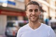 © Krakenimages.com - Young caucasian man smiling confident standing at street