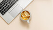 © Natureveryday - Laptop with cup of tea with lemon, copy space for design and branding. Home office template, office desktop, aesthetic workspace, top view