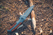 © freeman83 - Folding hunting knife for survival and sharpened peg lie ground.