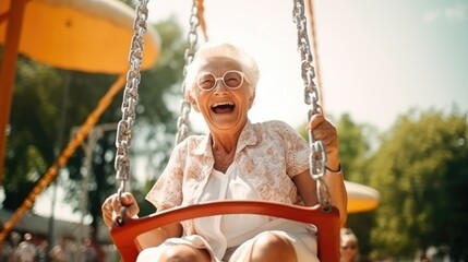 funny and smiling elderly woman of about 90 has fun on the swing, radiating joy and happiness. gener