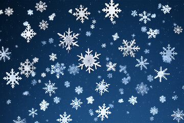 Wall Mural - Many white snowflakes falling down on a dark blue background