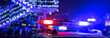 canvas print picture - police car lights in the night city