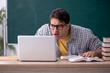 © Elnur - Young male student in telestudy concept