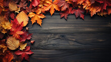 Border Frame Of Colorful Autumn Leaves Isolated On Wooden Background. Autumn Concept. Space For Text