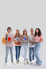 Wall Mural - Group of students on light background