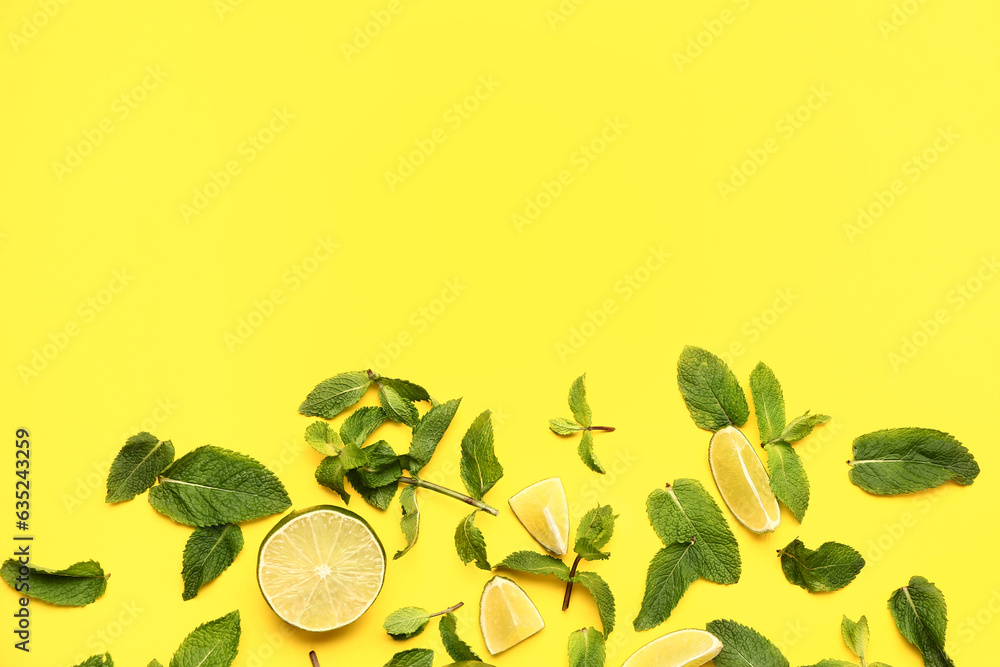 Composition with fresh mint leaves and limes on yellow background