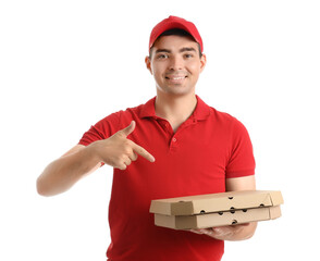 Male courier pointing at pizza boxes on white background