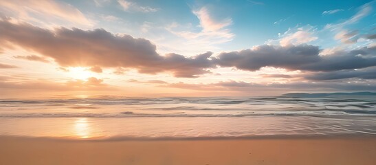 Wall Mural - 青空とオレンジ色の夕焼けがグラデーションするビーチの美しい風景