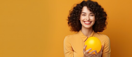 Poster - Smiling young woman holding object looking satisfied