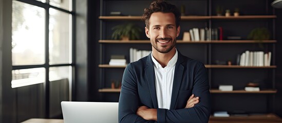 Wall Mural - Millennial man happy businessman at office desk posing and smiling at camera Copy space