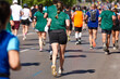 © h368k742 - Runners on the street. Healthy lifestyle. Jogging exercise. Athletics