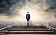 © MUS_GRAPHIC - Ambitious business man climbing stairs to success