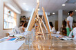 © Alfonso Soler - Art and Wine Workshop. Blank canvases on painting easels in workshop.