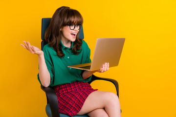 Sticker - Photo of charming impressed lady wear green shirt online shopping modern gadget empty space isolated yellow color background